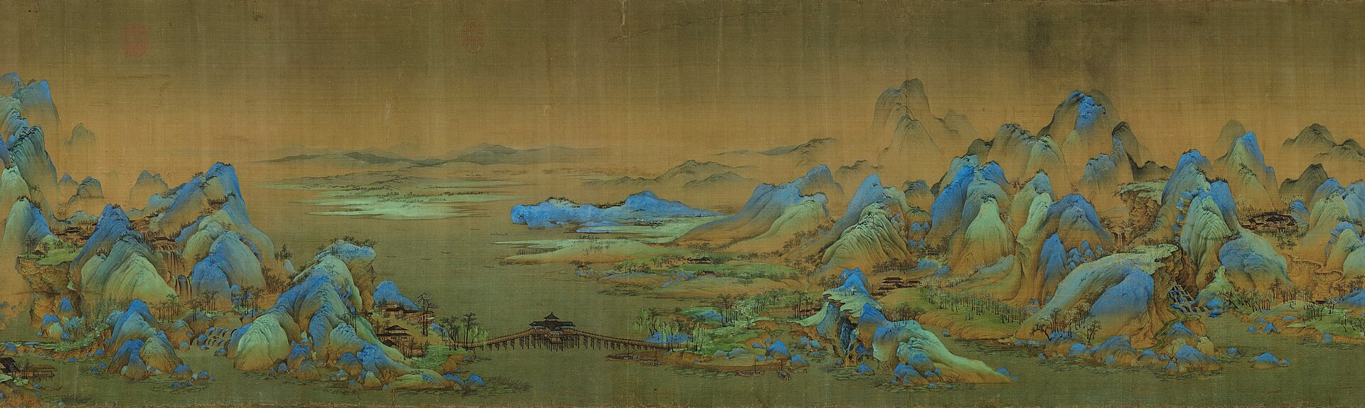 A section of Wang Ximeng's blue-green landscape scroll: mountains, water and a long bridge